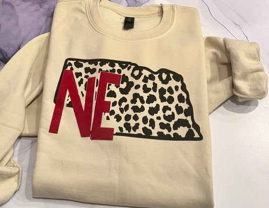 NE ANIMAL PRINT FLOCKED