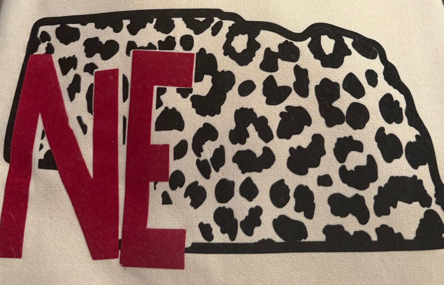 NE ANIMAL PRINT FLOCKED