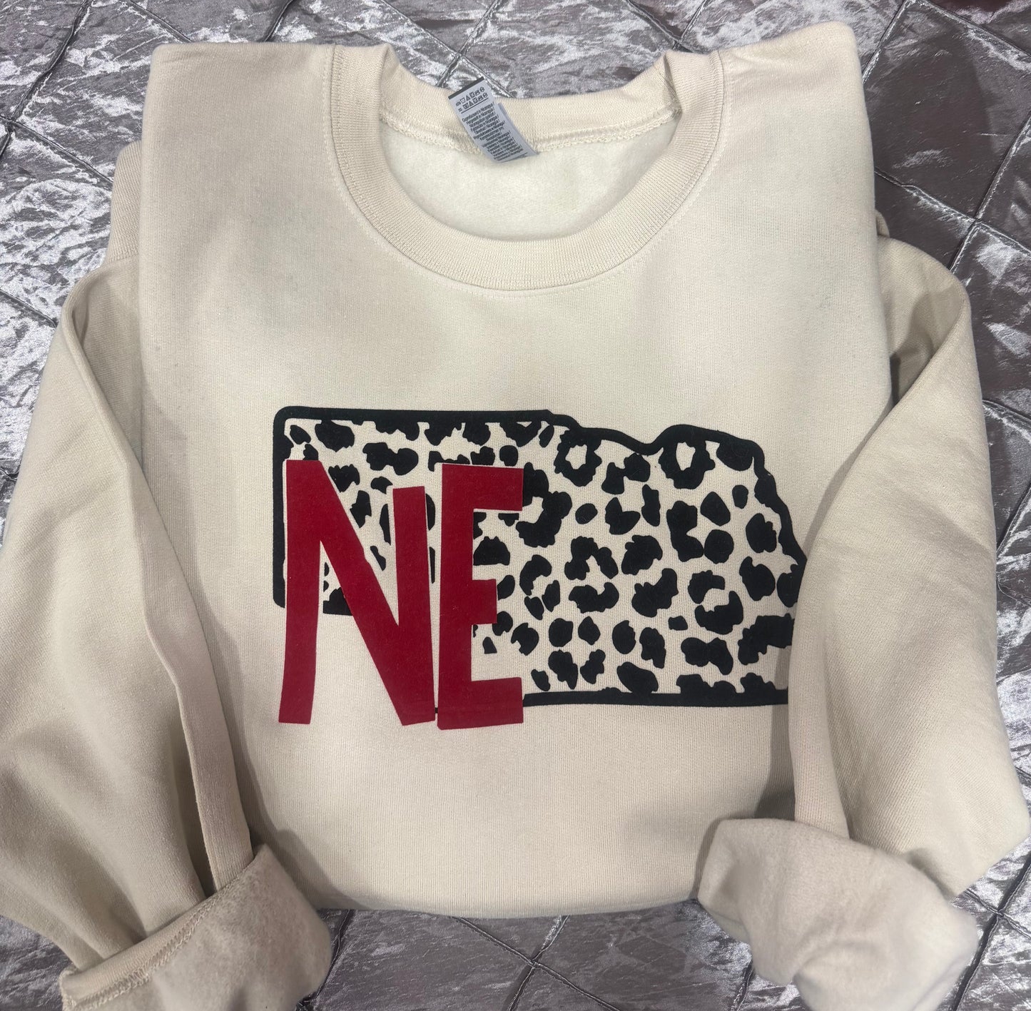 NE ANIMAL PRINT FLOCKED